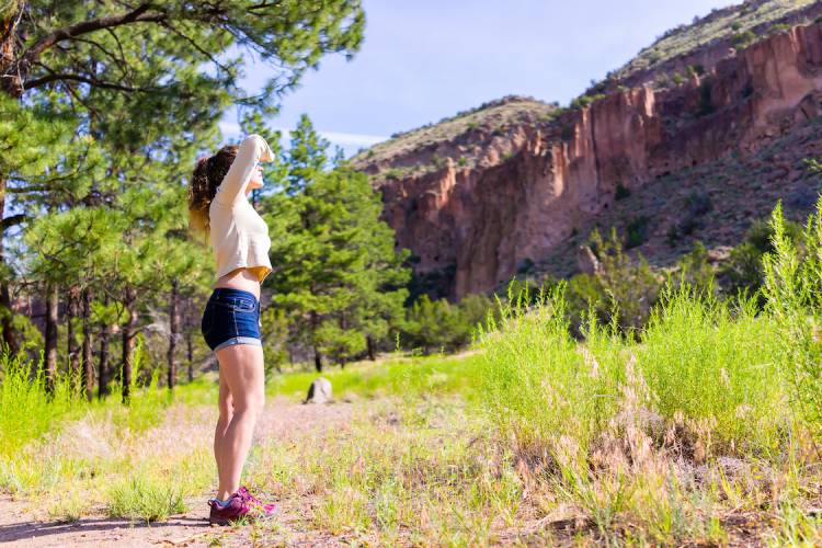 woman on hiking trail in new mexico